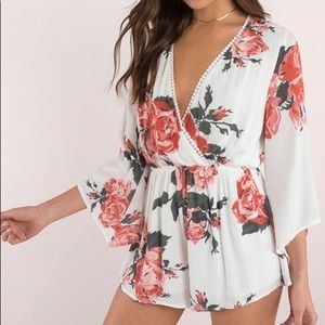 CAN'T LET GO IVORY MULTI ROSE PRINT ROMPER